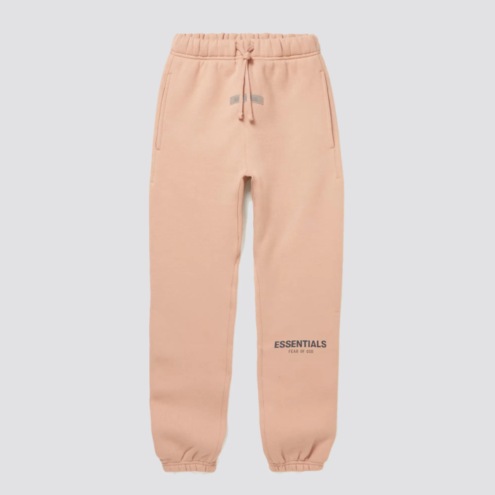 The Fear of God Essentials Kids Tracksuit in pink is a stylish and comfortable tracksuit set for children. It is made by Fear of God, a luxury fashion brand known for its street-inspired and casual designs. The tracksuit is made of a comfortable and durable fabric, and comes in a pink color. The set includes a full-zip hoodie and pants with ribbed cuffs and hem for a snug fit. The tracksuit often features the brand's logo on the chest. The pink color gives it a playful and unique look, perfect for any child that loves to stand out with their clothing.