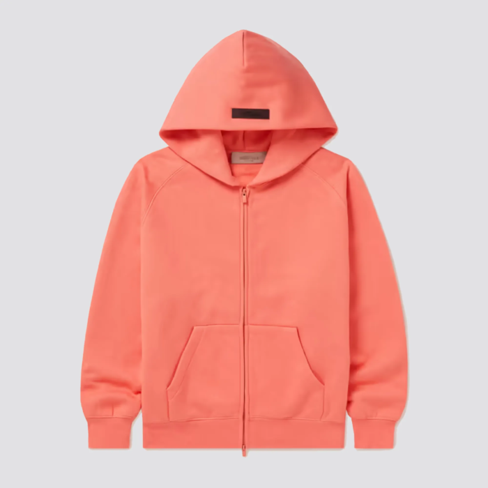 The Fear of God Essentials Kids Zip-up Hoodie is a stylish and comfortable hoodie for children. It is made by Fear of God, a luxury fashion brand known for its street-inspired and casual designs. The hoodie features a full-zip front design, a hood with drawstring, and ribbed cuffs and hem for a snug fit. The hoodie is usually made of soft and comfortable cotton material and comes in a variety of colors. It's perfect for everyday wear and can be paired with various types of pants and sneakers.