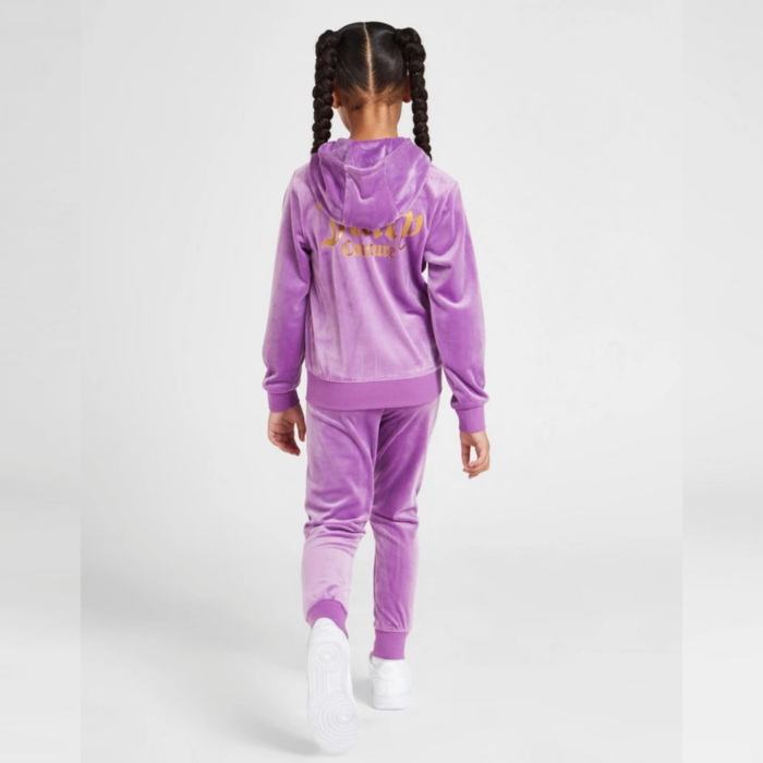 The Juicy Couture Girls' Velour Full Zip Tracksuit in purple is a stylish and comfortable tracksuit for girls. It is made of a soft velour fabric that is both warm and stretchy. The tracksuit features a full zip front, ribbed cuffs and waistband, and two front pockets. The Juicy Couture logo is embroidered on the left chest and on the back of the pants. The purple color gives it a unique and attractive look. The set includes both top and bottom. Juicy Couture is known for their high-end tracksuits and this one is no exception, it is likely to be a bit more expensive than other kids tracksuits.